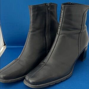 Sleek Black Leather Heeled Boots